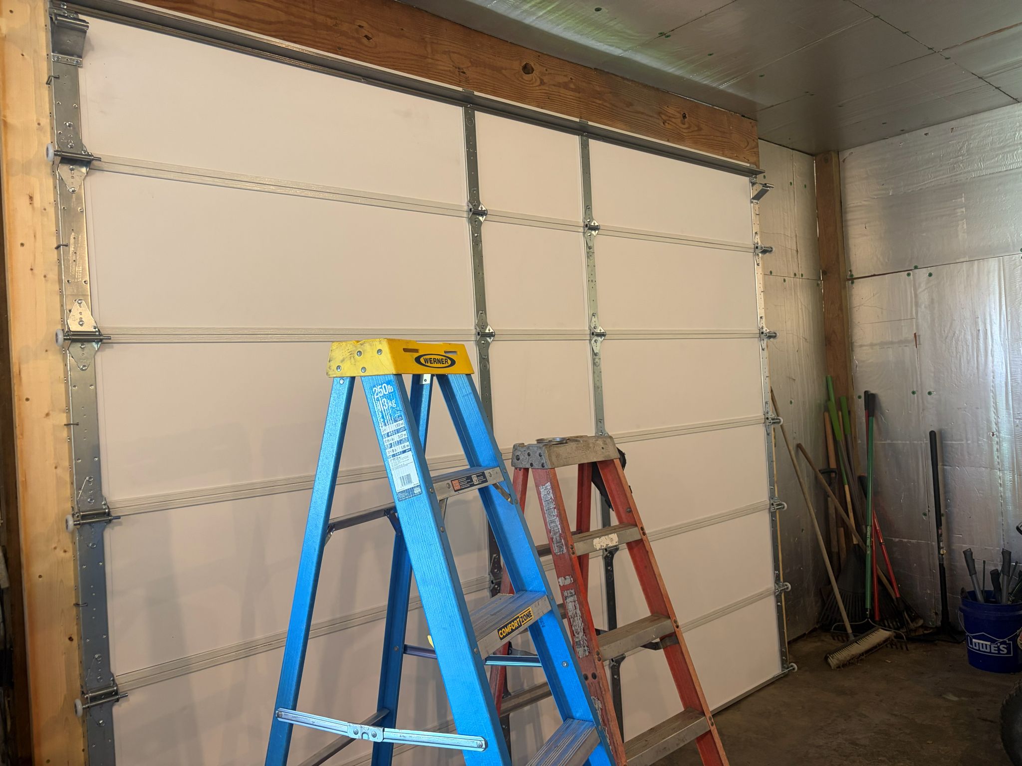 Partial Larry Garage Door Install with panels up.