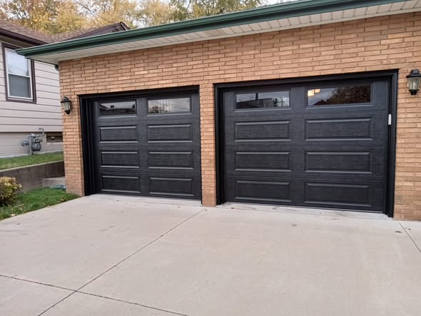 Completed residential dobule garage door installation